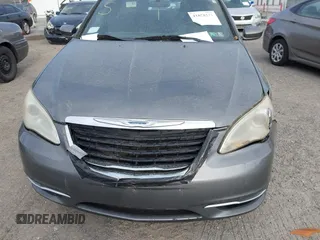 2011 Chrysler 200 Touring z VIN 1C3BC1FB2BN602536, wystawiony jako IAAI lot #41858171 z przebiegiem Nie podano mil oraz . Historia ofert i sprzedaży dostępna na DreamBid. Obrazek 6.