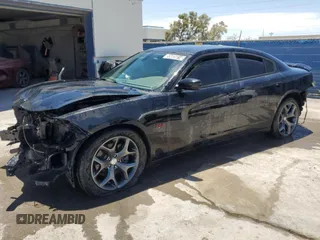 2015 Dodge Charger RT with VIN 2C3CDXCT9FH918273, listed as a Copart auction lot 55605814 with 101,521 mi miles and Clean Title. Bid and sale history available at DreamBid. Image 1.