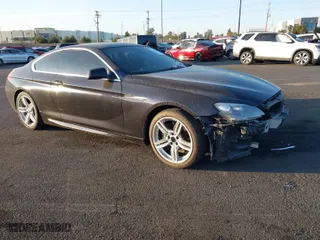 2012 BMW 6 Series 650i with VIN WBALX3C56CDV77689, listed as a IAAI auction lot 41840326 with 92,218 mi miles. Bid and sale history available at carsss.com. Image 1.