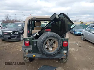 1997 Jeep Wrangler SE with VIN 1J4FY29PXVP406939, listed as a IAAI auction lot 41612380 with 248,314 mi miles. Bid and sale history available at carsss.com. Image 16.