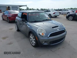 2007 MINI Hardtop S with VIN WMWMF73557TV31801, listed as a IAAI auction lot 42627295 with 72,480 mi miles and . Bid and sale history available at DreamBid. Image 1.