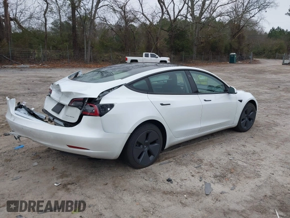 2023 Tesla Model 3 Long Range with VIN 5YJ3E1EB9PF393622, listed as a IAAI auction lot 41207132 with 14,097 mi miles and . Bid and sale history available at DreamBid. Image 4.