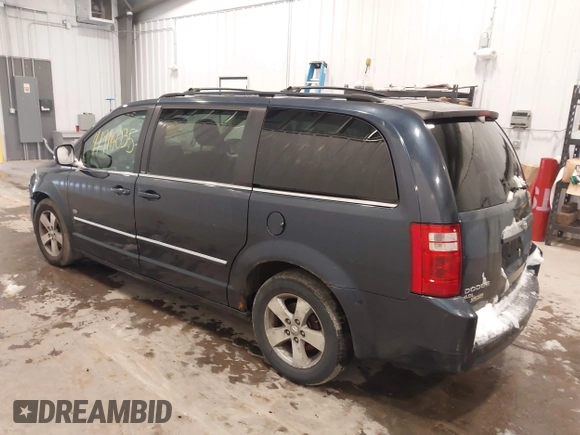 2009 Dodge Grand Caravan SXT z VIN 2D8HN54X89R645251, wystawiony jako IAAI lot #41916035 z przebiegiem 183 678 mil mil oraz . Historia ofert i sprzedaży dostępna na DreamBid. Obrazek 3.