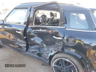 2013 MINI Countryman S z VIN WMWZC3C57DWP22928, wystawiony jako IAAI lot #41665753 z przebiegiem Nie podano mil oraz . Historia ofert i sprzedaży dostępna na DreamBid. Obrazek 6.