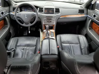2015 Lincoln MKS z VIN 1LNHL9DK6FG604609, wystawiony jako Copart lot #56243135 z przebiegiem 82 622 mil mil oraz Szkoda całkowita • Salvage title. Historia ofert i sprzedaży dostępna na DreamBid. Obrazek 8.