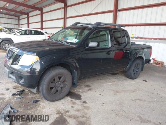 2011 Nissan Frontier Pro-4X with VIN 1N6AD0EV6BC437545, listed as a IAAI auction lot 42633761 with 181,753 mi miles and . Bid and sale history available at DreamBid. Image 17.