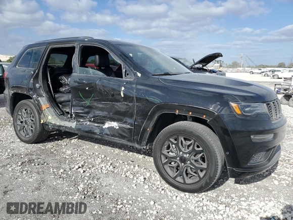2021 Jeep Grand Cherokee 80th Anniversary z VIN 1C4RJEBG1MC844595, wystawiony jako Copart lot #54899195 z przebiegiem 19 287 mil mil oraz Szkoda całkowita • Salvage title. Historia ofert i sprzedaży dostępna na DreamBid. Obrazek 4.