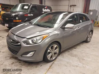 2013 Hyundai Elantra GT with VIN KMHD35LE7DU044309, listed as a IAAI auction lot 41988026 with 128,636 mi miles. Bid and sale history available at carsss.com. Image 2.