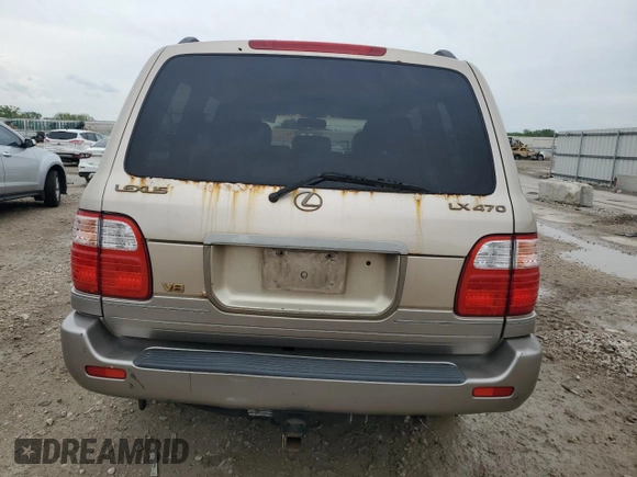 1999 Lexus LX 470 with VIN JT6HT00W2X0043805, listed as a Copart auction lot 54496735 with 520,244 mi miles and Clean Title. Bid and sale history available at DreamBid. Image 6.