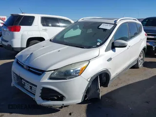 2016 Ford Escape Titanium with VIN 1FMCU0J96GUB36680, listed as a IAAI auction lot 41446705 with 137,926 mi miles. Bid and sale history available at carsss.com. Image 16.