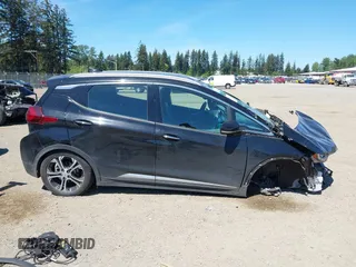 2018 Chevrolet Bolt EV Premier z VIN 1G1FX6S03J4130637, wystawiony jako IAAI lot #42185946 z przebiegiem 39 014 mil mil oraz . Historia ofert i sprzedaży dostępna na DreamBid. Obrazek 14.