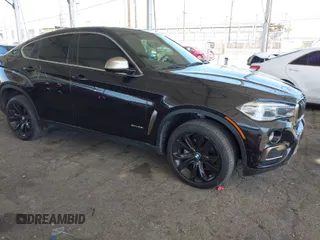 2017 BMW X6 xDrive35i with VIN 5UXKU2C56H0N85080, listed as a IAAI auction lot 41955473 with 142,201 mi miles. Bid and sale history available at carsss.com. Image 1.