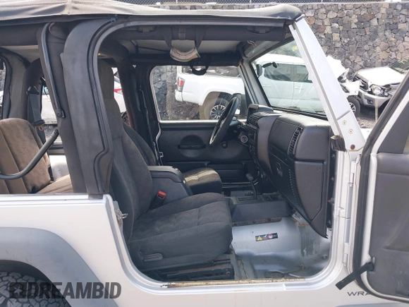 2004 Jeep Wrangler Sport with VIN 1J4FA49S04P781581, listed as a IAAI auction lot 42078693 with 111,123 mi miles and . Bid and sale history available at DreamBid. Image 5.
