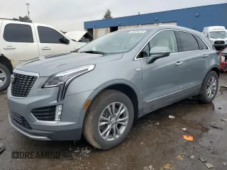 2023 Cadillac XT5 AWD Premium Luxury with VIN 1GYKNDRS6PZ195222, listed as a Copart auction lot 43034615 with 12,052 mi miles and Salvage Title. Bid and sale history available at DreamBid. Image 1.