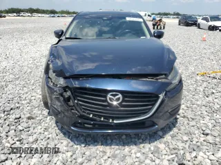 2018 Mazda 3 Touring z VIN 3MZBN1V30JM243211, wystawiony jako Copart lot #58324975 z przebiegiem 86 030 mil mil oraz Szkoda całkowita • Salvage title. Historia ofert i sprzedaży dostępna na DreamBid. Obrazek 5.