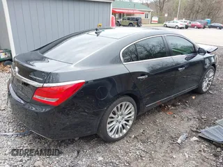 2014 Buick LaCrosse Premium II with VIN 1G4GF5G39EF172201, listed as a IAAI auction lot 41963281 with 106,231 mi miles and . Bid and sale history available at DreamBid. Image 4.