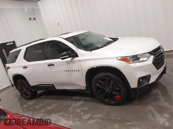 2018 Chevrolet Traverse Premier z VIN 1GNEVJKW4JJ163087, wystawiony jako IAAI lot #41509692 z przebiegiem 118 158 mil mil oraz . Historia ofert i sprzedaży dostępna na DreamBid. Obrazek 13.