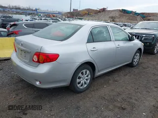 2010 Toyota Corolla with VIN 1NXBU4EE7AZ206138, listed as a IAAI auction lot 41607099 with 189,728 mi miles. Bid and sale history available at carsss.com. Image 4.