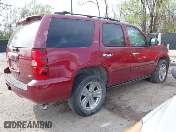 2007 Chevrolet Tahoe LTZ with VIN 1GNFK130X7R319974, listed as a IAAI auction lot 41955206 with 187,445 mi miles and . Bid and sale history available at DreamBid. Image 4.