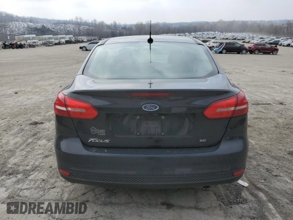 2015 Ford Focus SE with VIN 1FADP3F21FL366618, listed as a Copart auction lot 48714015 with 172,776 mi miles and Salvage Title. Bid and sale history available at DreamBid. Image 6.