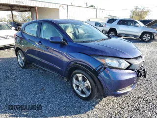 2017 Honda HR-V LX with VIN 3CZRU6H31HG703590, listed as a Copart auction lot 84173064 with 83,402 mi miles and Salvage Title. Bid and sale history available at carsss.com. Image 4.