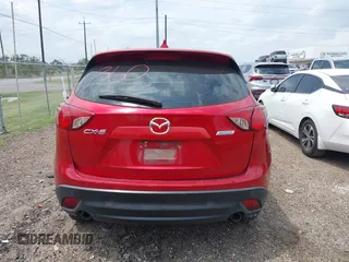2016 Mazda CX-5 Sport with VIN JM3KE2BYXG0668401, listed as a IAAI auction lot 42370910 with Not provided miles and . Bid and sale history available at DreamBid. Image 17.