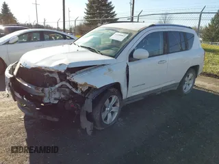 2014 Jeep Compass Latitude with VIN 1C4NJCEB0ED660019, listed as a IAAI auction lot 41200065 with 185,174 mi miles. Bid and sale history available at carsss.com. Image 2.