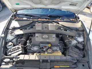 2013 Nissan 370Z z VIN JN1AZ4EH4DM380820, wystawiony jako IAAI lot #41547638 z przebiegiem 118 222 mil mil oraz . Historia ofert i sprzedaży dostępna na DreamBid. Obrazek 10.
