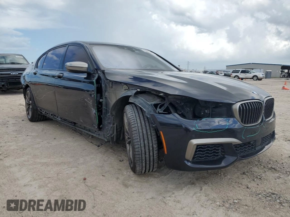 2019 BMW 7 Series M760i xDrive with VIN WBA7H6C58KG615081, listed as a Copart auction lot 59361704 with 92,769 mi miles and Salvage Title. Bid and sale history available at carsss.com. Image 4.