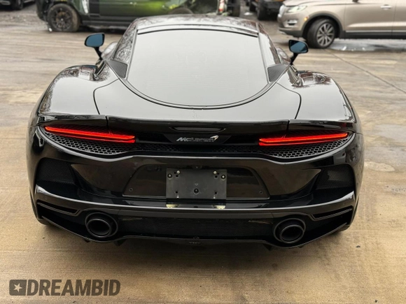 2023 McLaren GT z VIN SBM22GCA3PW002548, wystawiony jako Copart lot #52157855 z przebiegiem 779 mil mil oraz Szkody całkowita. Historia ofert i sprzedaży dostępna na DreamBid. Obrazek 11.