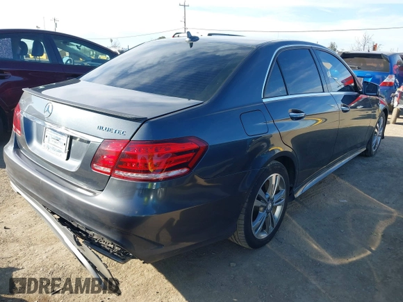 2014 Mercedes-Benz E-Class E 250 BlueTEC Luxury with VIN WDDHF0EB0EA876408, listed as a IAAI auction lot 41614679 with 283,695 mi miles. Bid and sale history available at carsss.com. Image 4.