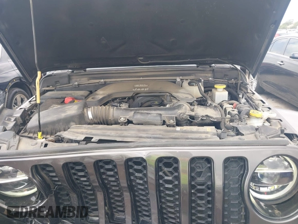 2021 Jeep Gladiator Overland with VIN 1C6HJTFG4ML617175, listed as a IAAI auction lot 42148031 with 70,627 mi miles and . Bid and sale history available at DreamBid. Image 10.