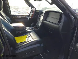 2015 Lincoln Navigator L with VIN 5LMJJ3JT3FEJ13389, listed as a IAAI auction lot 41205754 with 117,883 mi miles. Bid and sale history available at carsss.com. Image 5.