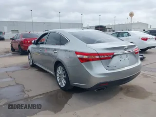 2015 Toyota Avalon Limited with VIN 4T1BK1EB2FU149980, listed as a IAAI auction lot 41897411 with 136,507 mi miles and . Bid and sale history available at DreamBid. Image 3.