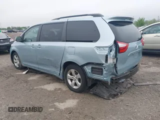 2015 Toyota Sienna LE AAS with VIN 5TDKK3DC4FS663876, listed as a IAAI auction lot 42155091 with 82,602 mi miles and . Bid and sale history available at DreamBid. Image 3.