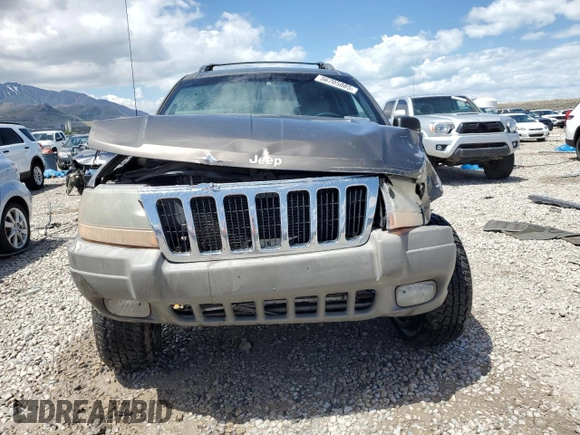 1999 Jeep Grand Cherokee Laredo с VIN 1J4GW58S5XC612309, выставлен на аукционе Copart как лот 56705085 с пробегом 200 004 миль миль и Списание • Salvage title. История ставок и продаж доступна на DreamBid. Изображение 5.