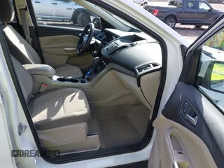 2014 Ford Escape SE with VIN 1FMCU0GXXEUC64892, listed as a IAAI auction lot 42101842 with 128,932 mi miles and . Bid and sale history available at DreamBid. Image 5.