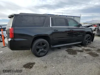 2017 Chevrolet Suburban LT with VIN 1GNSCHKCXHR233937, listed as a Copart auction lot 86526814 with 163,210 mi miles and Salvage Title. Bid and sale history available at carsss.com. Image 3.