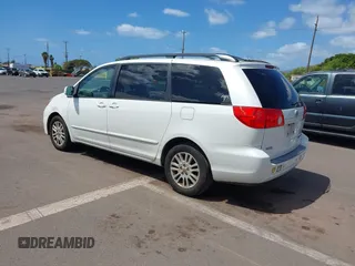2010 Toyota Sienna XLE with VIN 5TDYK4CC7AS291119, listed as a IAAI auction lot 41742917 with 201,590 mi miles. Bid and sale history available at carsss.com. Image 3.