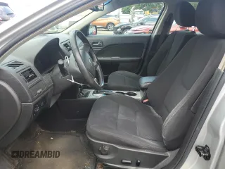 2010 Ford Fusion Hybrid with VIN 3FADP0L33AR140229, listed as a Copart auction lot 63084475 with 164,313 mi miles and Salvage title. Bid and sale history available at DreamBid. Image 7.