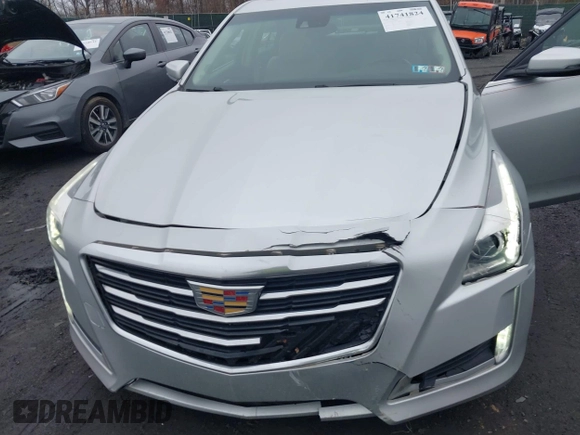 2014 Cadillac CTS Luxury AWD z VIN 1G6AX5SX3E0194895, wystawiony jako IAAI lot #41741824 z przebiegiem 197 042 mil mil oraz . Historia ofert i sprzedaży dostępna na DreamBid. Obrazek 6.