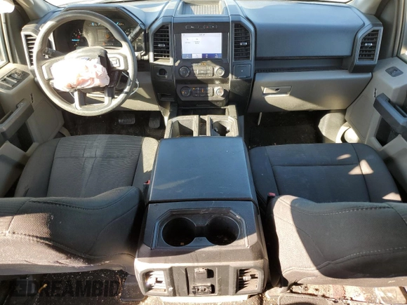 2020 Ford F-150 XL with VIN 1FTEW1CPXLKD42809, listed as a Copart auction lot 87208204 with 104,049 mi miles and Salvage Title. Bid and sale history available at carsss.com. Image 8.