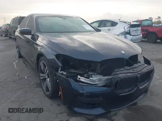 2016 BMW 7 Series 740i with VIN WBA7E2C51GG547537, listed as a IAAI auction lot 41794434 with 149,655 mi miles. Bid and sale history available at carsss.com. Image 1.