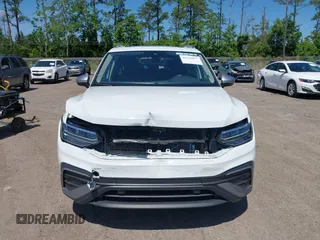 2024 Volkswagen Tiguan with VIN 3VVTB7AX9RM217926, listed as a IAAI auction lot 42339057 with 8,233 mi miles and . Bid and sale history available at DreamBid. Image 13.
