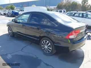 2010 Honda Civic Sdn LX with VIN 2HGFA1F55AH302155, listed as a IAAI auction lot 41799279 with 122,638 mi miles. Bid and sale history available at carsss.com. Image 3.