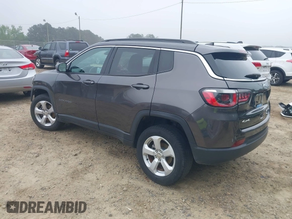 2019 Jeep Compass Latitude with VIN 3C4NJDBB8KT748588, listed as a IAAI auction lot 42224482 with 70,810 mi miles and . Bid and sale history available at DreamBid. Image 3.