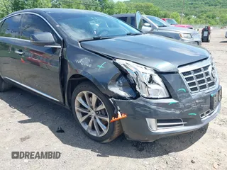 2013 Cadillac XTS Luxury z VIN 2G61R5S33D9101434, wystawiony jako IAAI lot #42290199 z przebiegiem 48 075 mil mil oraz . Historia ofert i sprzedaży dostępna na DreamBid. Obrazek 17.