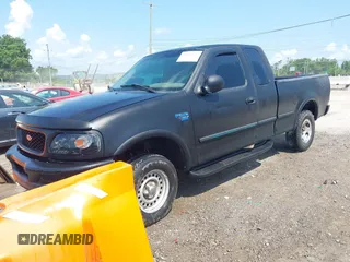 1998 Ford F-150 with VIN 1FTRX18L2WKA67414, listed as a IAAI auction lot 42583873 with 189,546 mi miles and . Bid and sale history available at DreamBid. Image 2.