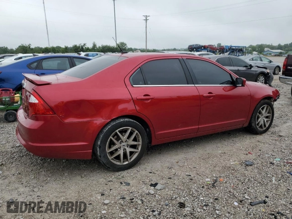 2012 Ford Fusion SEL z VIN 3FAHP0JG2CR309554, wystawiony jako Copart lot #60869895 z przebiegiem 199 134 mil mil oraz Szkoda całkowita • Salvage title. Historia ofert i sprzedaży dostępna na DreamBid. Obrazek 3.