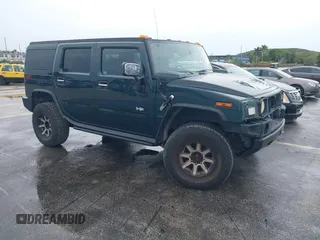 2005 Hummer H2 SUV with VIN 5GRGN23U55H104078, listed as a IAAI auction lot 41638313 with 228,858 mi miles. Bid and sale history available at carsss.com. Image 1.